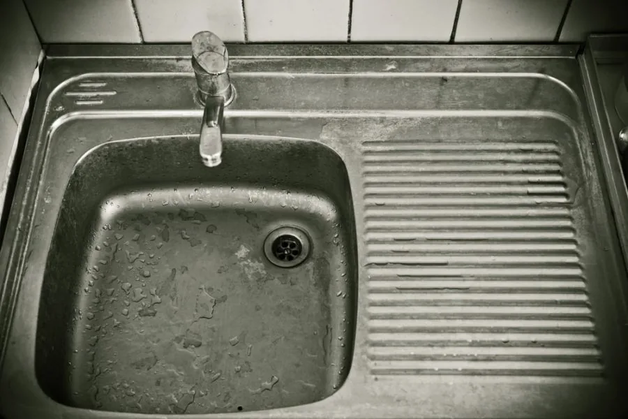 Kitchen sink in need of kitchen demolition